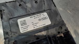 Body control computer from a Audi A7 Sportback (4KA) 3.0 V6 24V 55 TFSI Mild Hybrid Quattro 2018