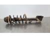 Fronts shock absorber, left from a Dacia Duster (HS), 2009 / 2018 1.2 TCE 16V 4x4, SUV, Petrol, 1.198cc, 92kW (125pk), 4x4, H5F410; H5FF4, 2015-06 / 2018-01, HSDCU 2017