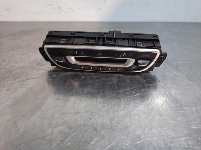 Heater control panel from a Renault Megane III Coupe (DZ) 1.5 dCi 105 2009
