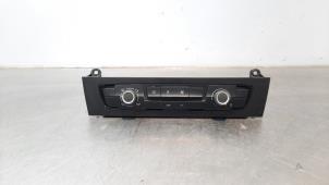 Used Air conditioning control panel BMW 1 serie (F20) 114i 1.6 16V Price € 254,10 Inclusive VAT offered by Autohandel Didier
