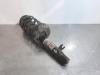 Fronts shock absorber, left from a Citroën C3 (SX/SW) 1.5 Blue HDi 100 16V 2021