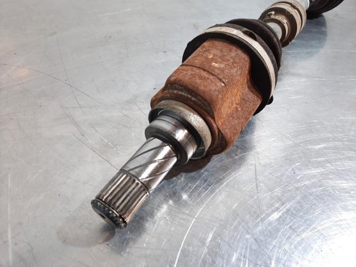 Front drive shaft, left from a Nissan Pulsar (C13) 1.2 DIG-T 16V 2015