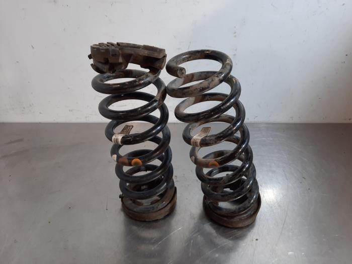 Rear coil spring from a Land Rover Discovery Sport (LC) 2.0 TD4 150 16V 2017