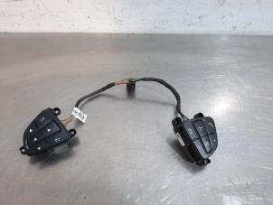 Used Steering wheel mounted radio control Mercedes A (W176) 1.6 A-160 16V Price € 54,45 Inclusive VAT offered by Autohandel Didier