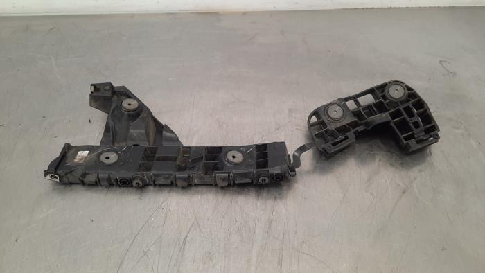 Rear bumper bracket, left from a Opel Astra K 1.5 CDTi 105 12V 2020