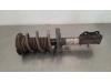 Fronts shock absorber, left from a Opel Astra K Sports Tourer 1.5 CDTi 105 12V 2021