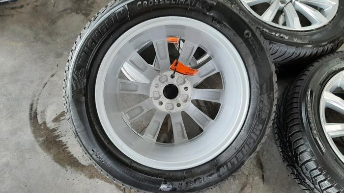 Set of wheels + winter tyres from a Volkswagen Passat Variant (3G5) 1.4 GTE 16V 2023