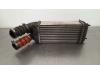 Intercooler from a Peugeot 208 I (CA/CC/CK/CL), 2012 / 2019 1.5 BlueHDi 100, Hatchback, Diesel, 1.499cc, 75kW (102pk), FWD, DV5RD; YHY, 2018-05 / 2019-12, CAYHY; CCYHY 2019
