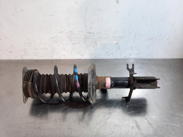 Fronts shock absorber, left from a Renault Twingo III (AH) 1.0 SCe 70 12V 2018