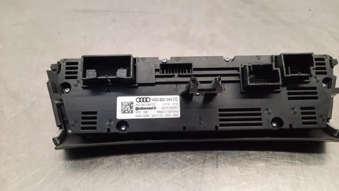 Air conditioning control panel from a Audi A6 Avant (C7) 3.0 TDI V6 24V biturbo Quattro 2015