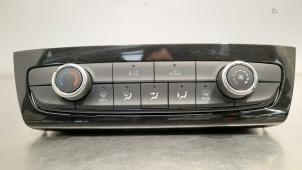 Used Air conditioning control panel Opel Corsa F (UB/UH/UP) 1.2 12V 75 Price € 102,85 Inclusive VAT offered by Autohandel Didier