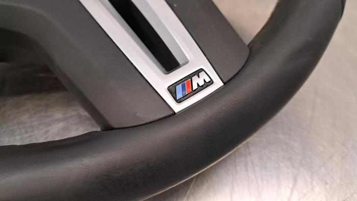 Steering wheel from a BMW X4 (G02) M40i 3.0 TwinPower Turbo 24V Mild Hybrid 2023