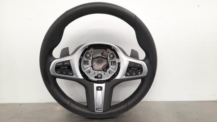 Steering wheel from a BMW 3 serie Touring (G21) M340d xDrive 3.0 Mild Hybrid 24V 2021