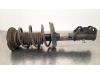Fronts shock absorber, left from a Opel Astra K Sports Tourer 1.5 CDTi 105 12V 2020