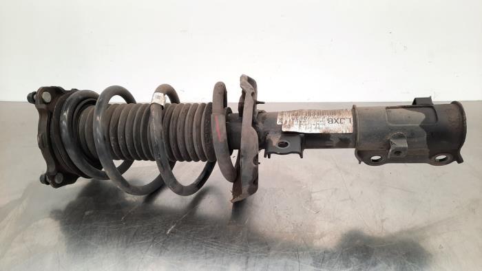 Fronts shock absorber, left from a Kia Ceed Sportswagon (CDF) 1.0i T-GDi 12V 2022