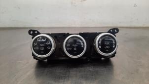Usados Panel de control de aire acondicionado Mitsubishi L-200 2.5 DI-D Precio € 133,10 IVA incluido ofrecido por Autohandel Didier