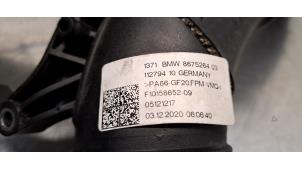 Intercooler Rohr van een BMW 1 serie (F40) M135i xDrive 2.0 TwinPower 16V 2021