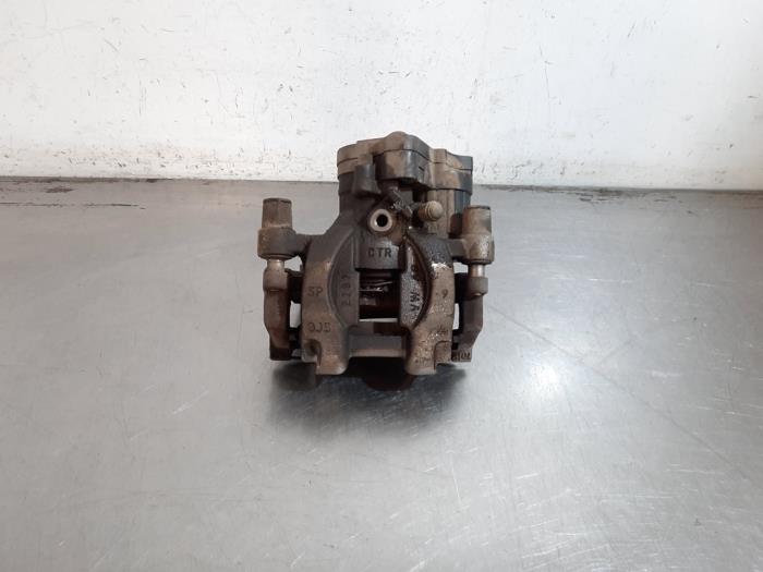 Gebrauchte Bremszange links hinten Volkswagen Tiguan (AD1) 2.0 TDI 16V BlueMotion Technology SCR Preis € 60,50 Mit Mehrwertsteuer angeboten von Autohandel Didier