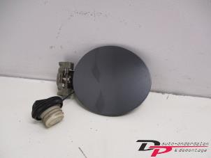 Used Tank cap cover Nissan Note (E11) 1.6 16V Price € 8,00 Margin scheme offered by DP Auto-onderdelen & Demontage