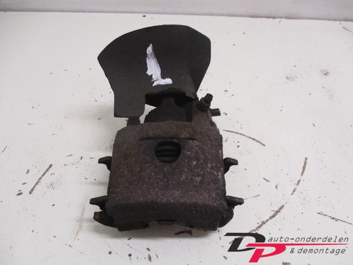 Front brake calliper, left from a Seat Arosa (6H1) 1.0 MPi 1998