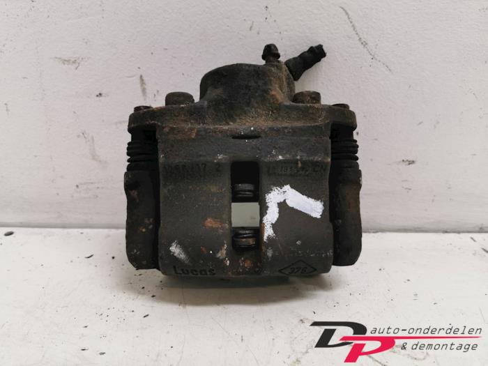 Front brake calliper, left from a Renault Megane Classic (LA) 1.4i RL,RN 1999