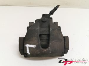 Used Front brake calliper, left Ford Focus 2 1.6 16V Price € 12,00 Margin scheme offered by DP Auto-onderdelen & Demontage