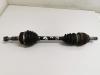 Front drive shaft, left from a Opel Vectra B Caravan (31) 1.6 16V 1999