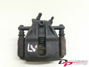 Used Front brake calliper, left Renault Modus/Grand Modus (JP) 1.4 16V Price € 12,60 Margin scheme offered by DP Auto-onderdelen & Demontage