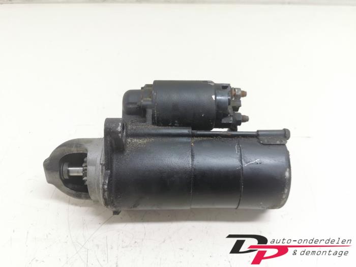 Starter from a Opel Signum (F48) 2.2 Direct 16V 2003