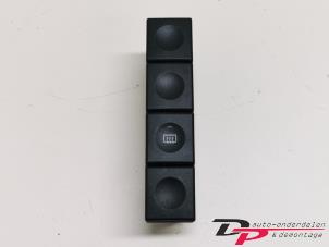 Usados Interruptor de calefactor luneta Ford Fiesta 5 (JD/JH) 1.3 Precio € 7,20 Norma de margen ofrecido por DP Auto-onderdelen & Demontage