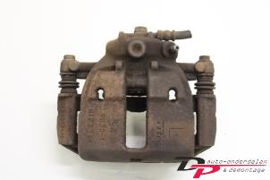 Used Front brake calliper, left Mitsubishi Colt (Z2/Z3) 1.1 12V Price € 10,00 Margin scheme offered by DP Auto-onderdelen & Demontage
