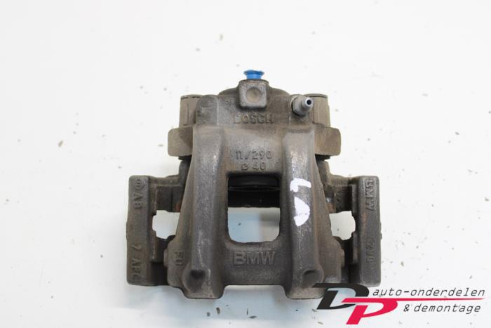 Gebrauchte Bremszange links hinten BMW 1 serie (F20) 114d 1.6 16V Preis € 7,14 Margenregelung angeboten von DP Auto-onderdelen & Demontage