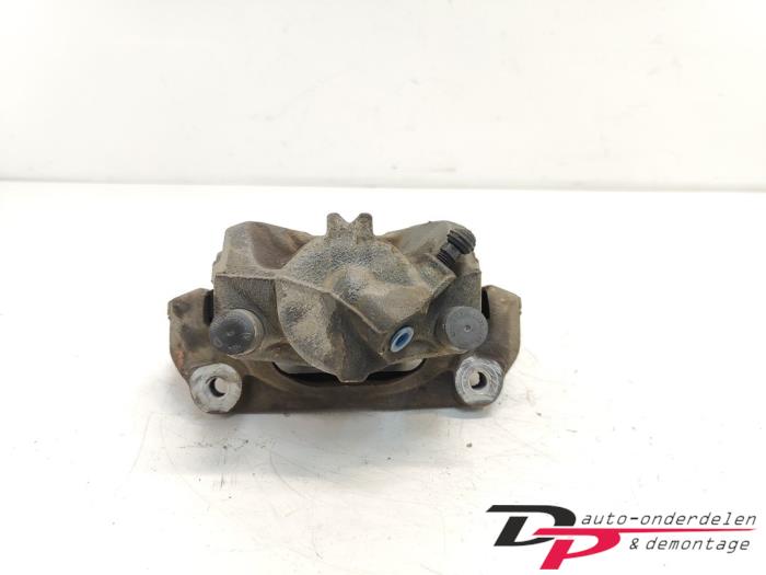 Front brake calliper, right from a Renault Megane III Coupe (DZ) 1.4 16V TCe 130 2010