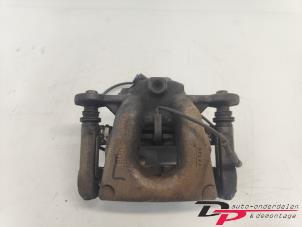 Used Front brake calliper, left BMW 1 serie (E87/87N) 118i 16V Price € 12,00 Margin scheme offered by DP Auto-onderdelen & Demontage