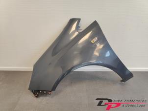 Used Front wing, left Opel Corsa D 1.2 16V Price € 40,00 Margin scheme offered by DP Auto-onderdelen & Demontage