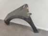 Front wing, left from a Peugeot 308 (4A/C) 1.6 VTI 16V 2007