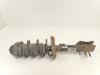 Opel Corsa D 1.2 16V Front shock absorber rod, left