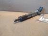 Injector (diesel) from a Volkswagen Polo V (6R) 1.6 TDI 16V 105 2011