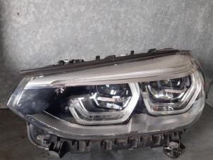Używane Reflektor lewy BMW X3 (G01) sDrive 18d 2.0 TwinPower Turbo 16V Cena € 675,00 Procedura marży oferowane przez Uittenbogaard onderdelen BV