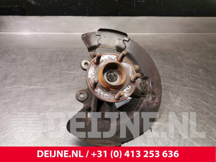 Knuckle, front left from a Volvo V50 (MW) 2.4 D5 20V Autom.. 2008