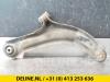 Front lower wishbone, left from a Renault Clio III (BR/CR) 1.2 16V 75 2009