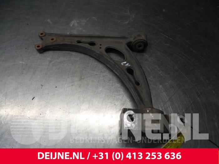 Front lower wishbone, left from a Volkswagen Eos (1F7/F8) 2.0 TDI DPF 2007