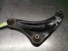 Front lower wishbone, left from a Nissan NV 200, Ch.Cab./Pick-up, 2014 2015