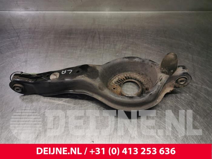 Rear spring retainer, left from a Volvo V40 (MV) 2.0 D4 16V 2014