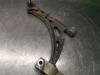 Front lower wishbone, left from a Volkswagen Caddy 2004