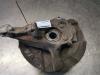 Knuckle, front left from a Volvo XC70 (SZ) XC70 2.4 T 20V 2002