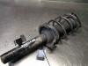 Front shock absorber rod, left from a Volvo S40 (MS) 1.6 D 16V 2010