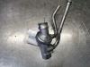 Thermostat housing from a Volvo S80 (AR/AS) 2.4 D 20V 2010
