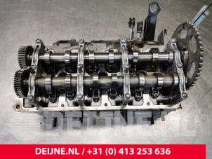 Used Cylinder head Audi Q7 Price € 302,50 Inclusive VAT offered by van Deijne Onderdelen Uden B.V.