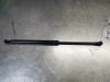 Rear gas strut, left from a Volvo V50 (MW)  2006